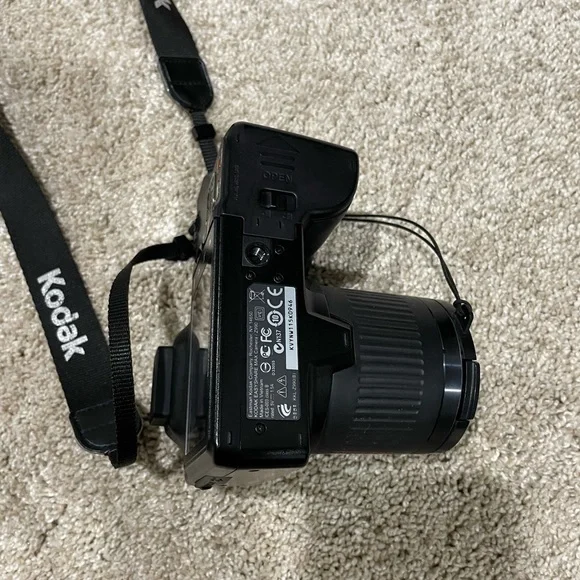 Black Kodak camera with accessories